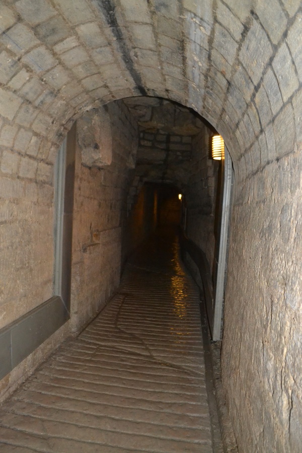 Heading toward the exit of the Catacombes.  By some miracle, I did not slip onto my ass while walking down these slippery tunnels.